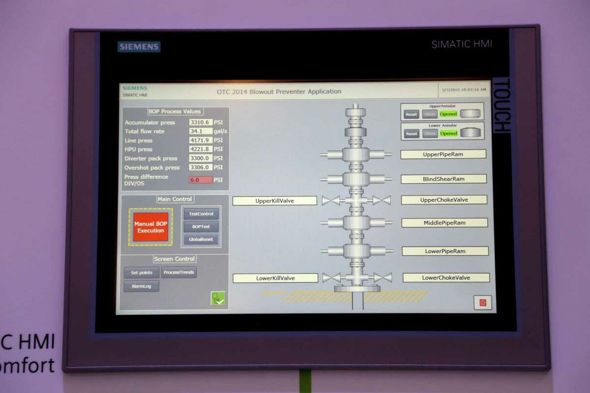 A Siemens SIMATIC HMI, human machine interface, TP1200 comfort touch panel programmable logic controller, used to monitor well heads to prevent a blowout, in the Siemens booth in the Offshore Technology Conference at the NRG Center Thursday, May 7, 2015, in Houston, Texas. ( Gary Coronado / Houston Chronicle )
