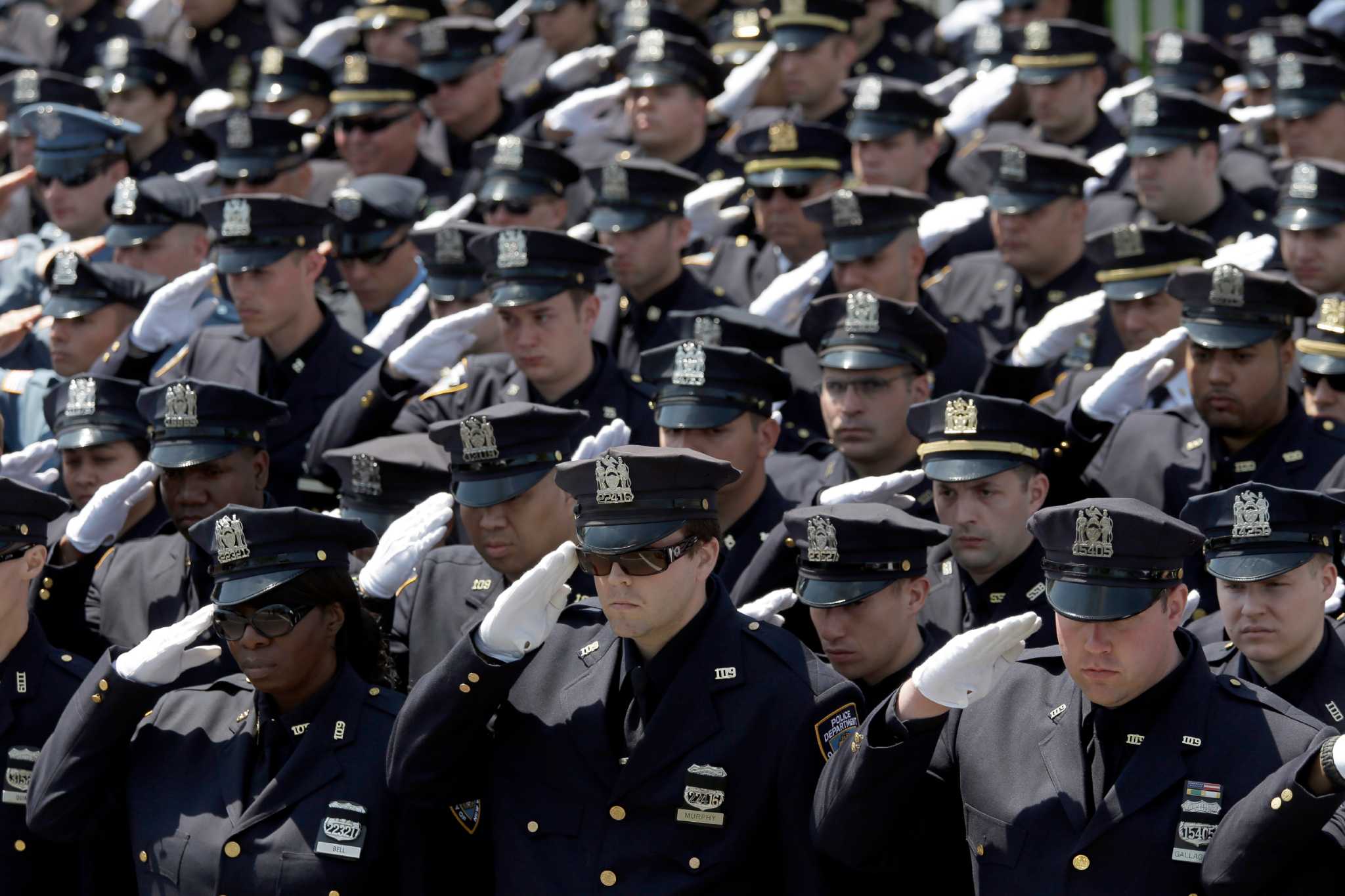 At New York officer's funeral, police reflect on tough time