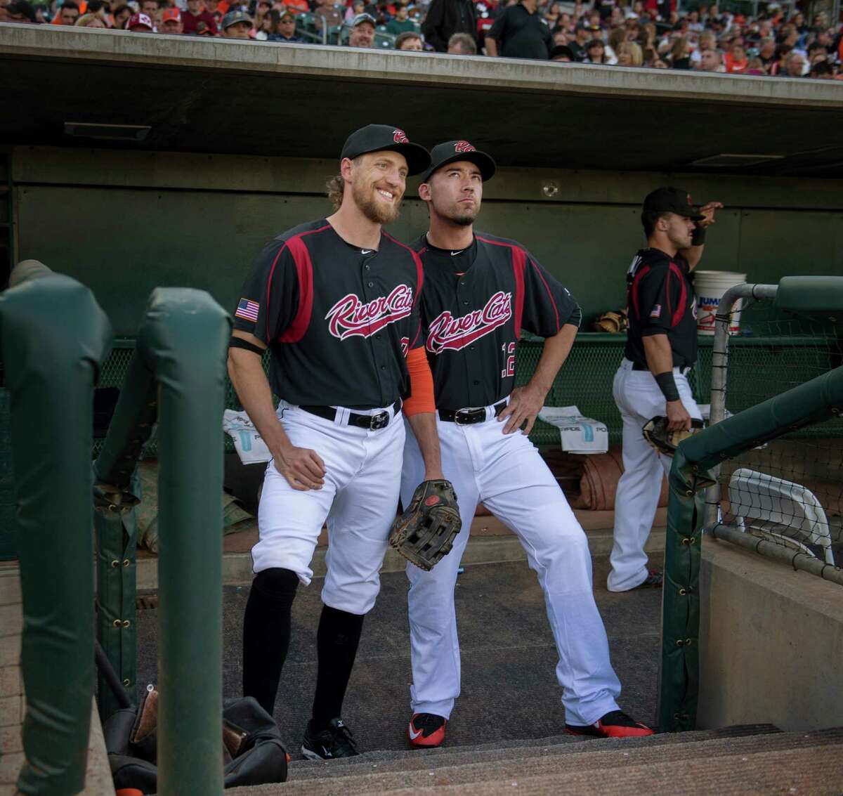 San Francisco Giants Hunter Pence stands with Travis Ishikawa before taking the field in the top of the first inning in his first rehab game for the Sacramento River Cats on Friday, May 8, 2015, at Raley Field in West Sacramento, California