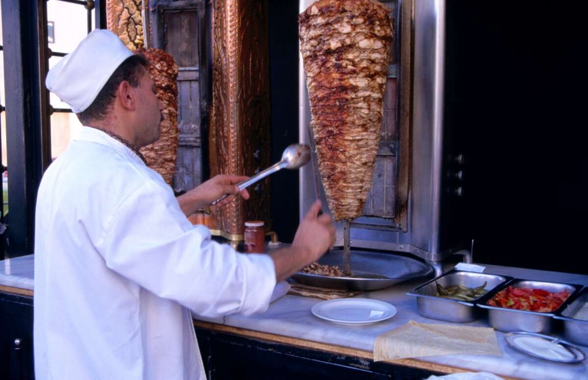 A shwarma stall looks nearly identical to a tacos al pastor stall.