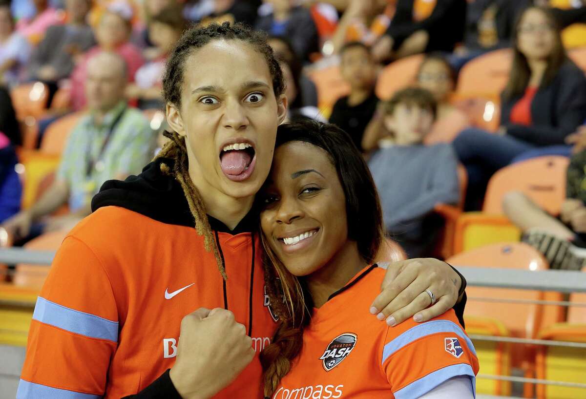 Brittney Griner, left, and her bride Glory Johnson attended a Houston Dash game last month before getting married in Phoenix on Friday.
