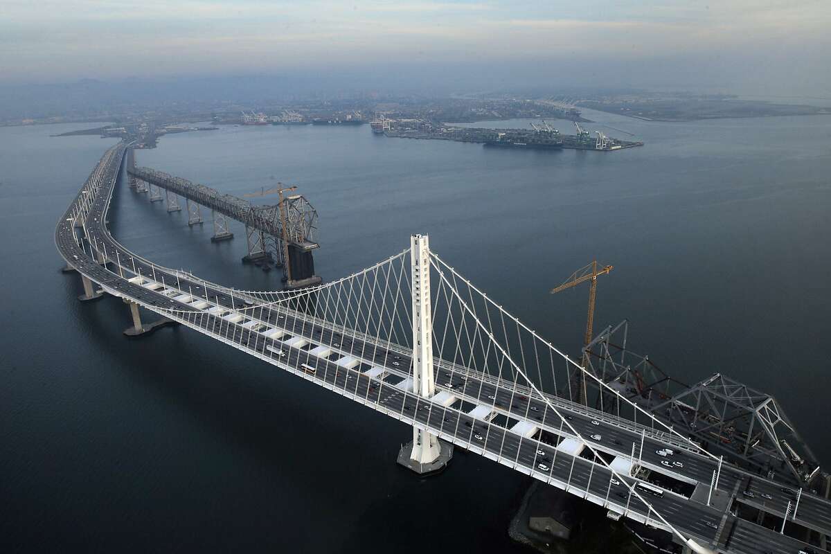 Aerial view of the Oakland/San Francisco Bay Bridge with the old cantilever section visible at the top in Oakland, Calif., on Wednesday, January 14, 2015.