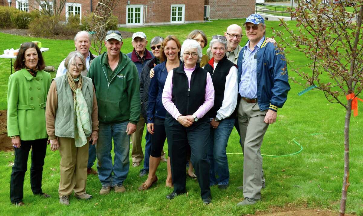 Posing for posterity on the occasion of tree plantings in Washington are, from left to right, in front, Gretchen Farmer, Gay Canal, Jeffery Stevens of Meadowbrook Gardens, Louise van Tartwijk, Sarah Jenkins, president of the Washington Garden Club, Denise Arturi and First Selectman Mark Lyon, and, in back, Nicholas Solley, selectman Tony Bedini, Betsy Manning, Cheryl Anderson and Dan Sherr. May 2015 Courtesy of the Washington Garden Club
