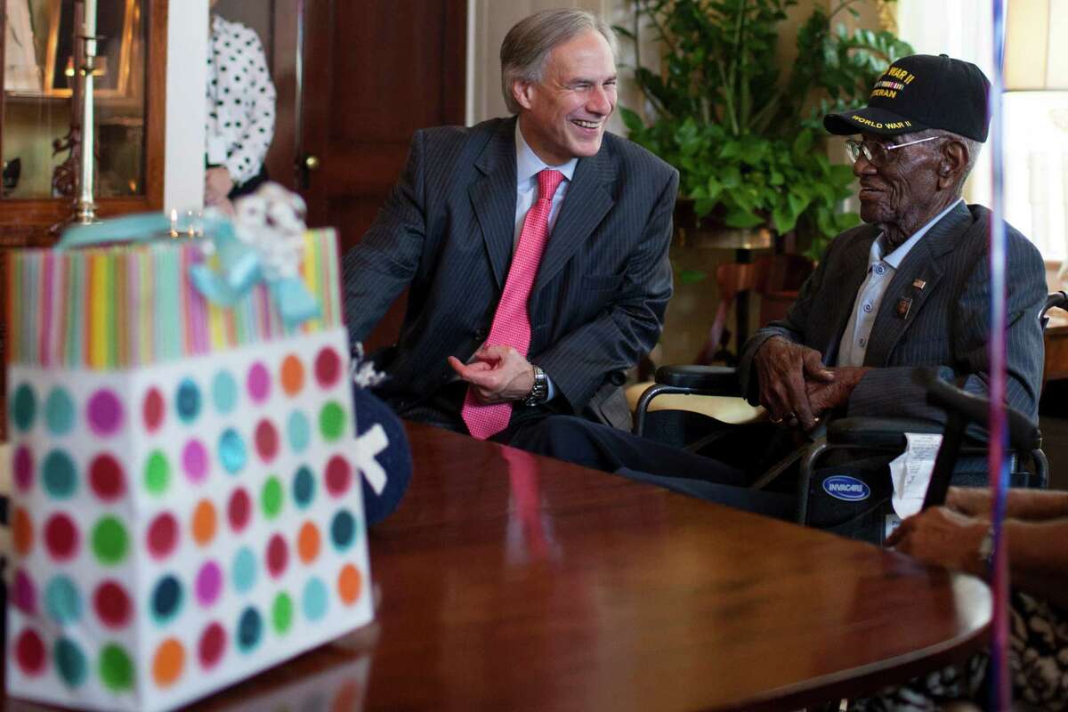 Governor Greg Abbott (left) welcomes Richard Overton (center) and Erline Love in the Conservatory Room of the Governor's Mansion Monday, May 11th, 2015. Governor Greg Abbott and First Lady Cecilia Abbott celebrated Richard Overtonâ€™s 109th birthday at the Texas Governorâ€™s Mansion on Monday, May 11th, 2015.Overton is the oldest living combat veteran from WWII. (Katie Hayes Luke for the San Antonio Express-News)