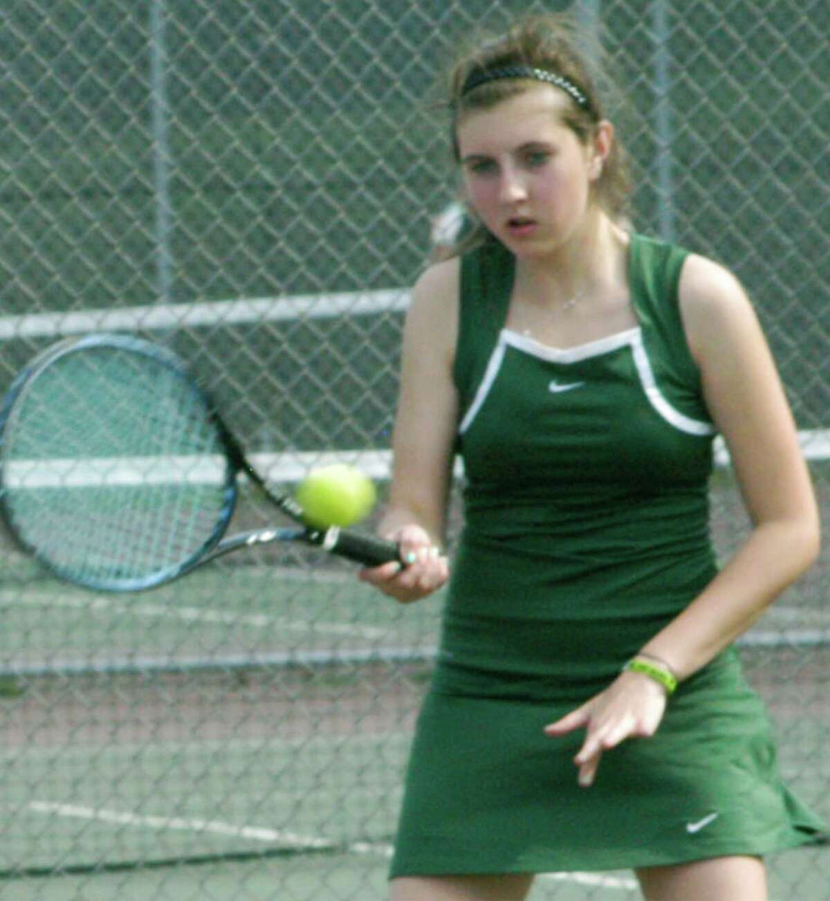 Amanda Aguayo, for three seasons the top singles player for the Green Wave, winds down her NMHS tennis career this week. May 2015