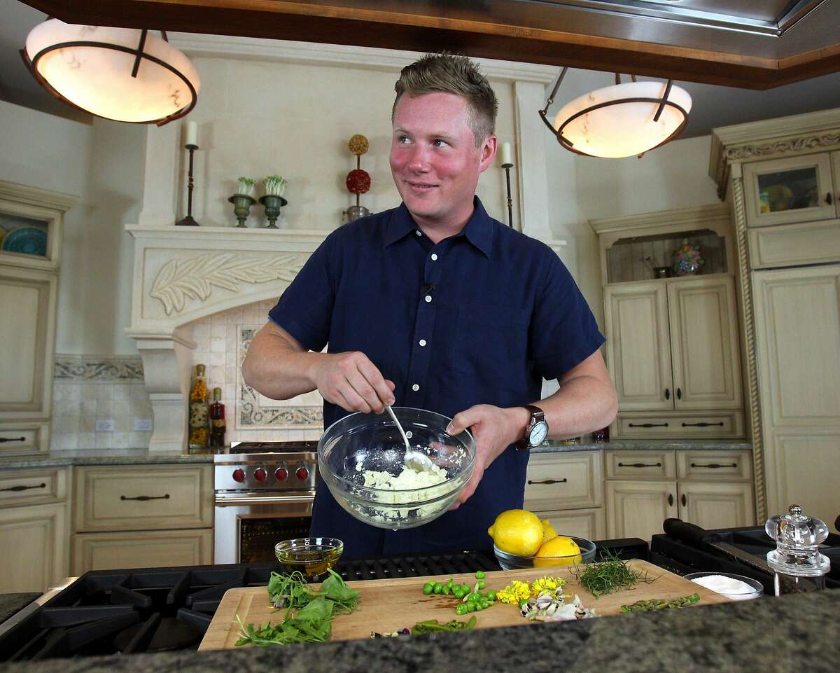Thomas Mcnaughton, chef owner of the S.F. Flour + Water, makes a ricotta composed salad, Monday, March 16, 2015, in Burlingame, Calif.