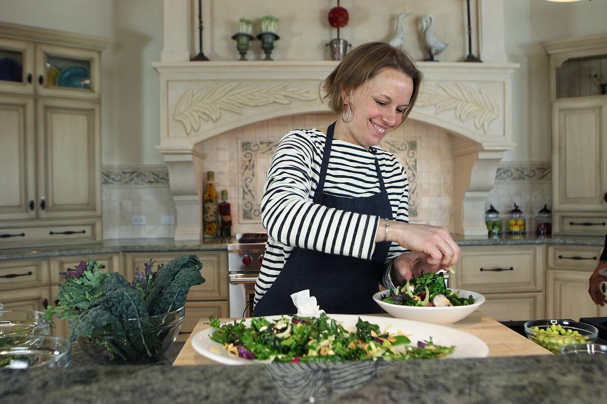 Melissa Perello, chef owner of S.F. restaurants Frances and Octavia, makes kale salad, Monday, March 16, 2015, in Burlingame, Calif.