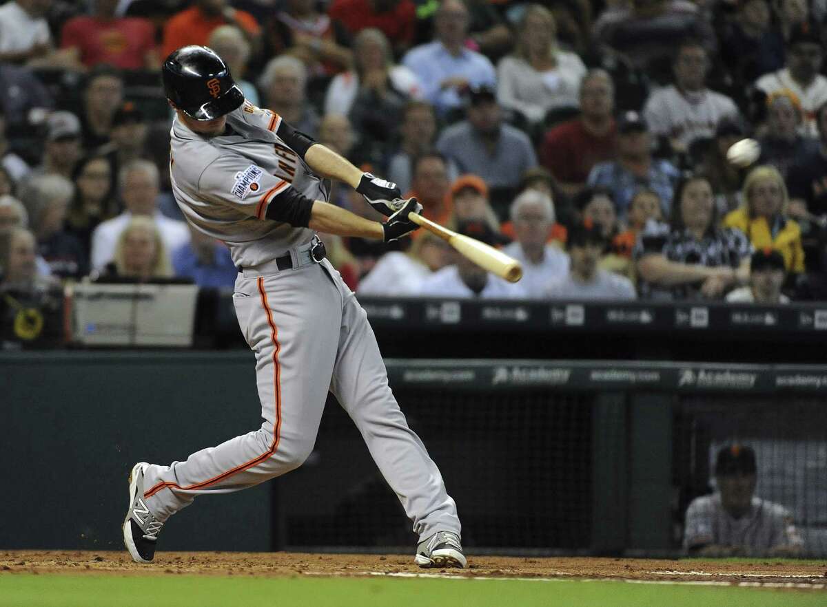 HOUSTON, TX - MAY 12: Matt Duffy #5 of the San Francisco Giants hits a three-run double during the second inning against the Houston Astros at Minute Maid Park on May 12, 2015 in Houston, Texas.