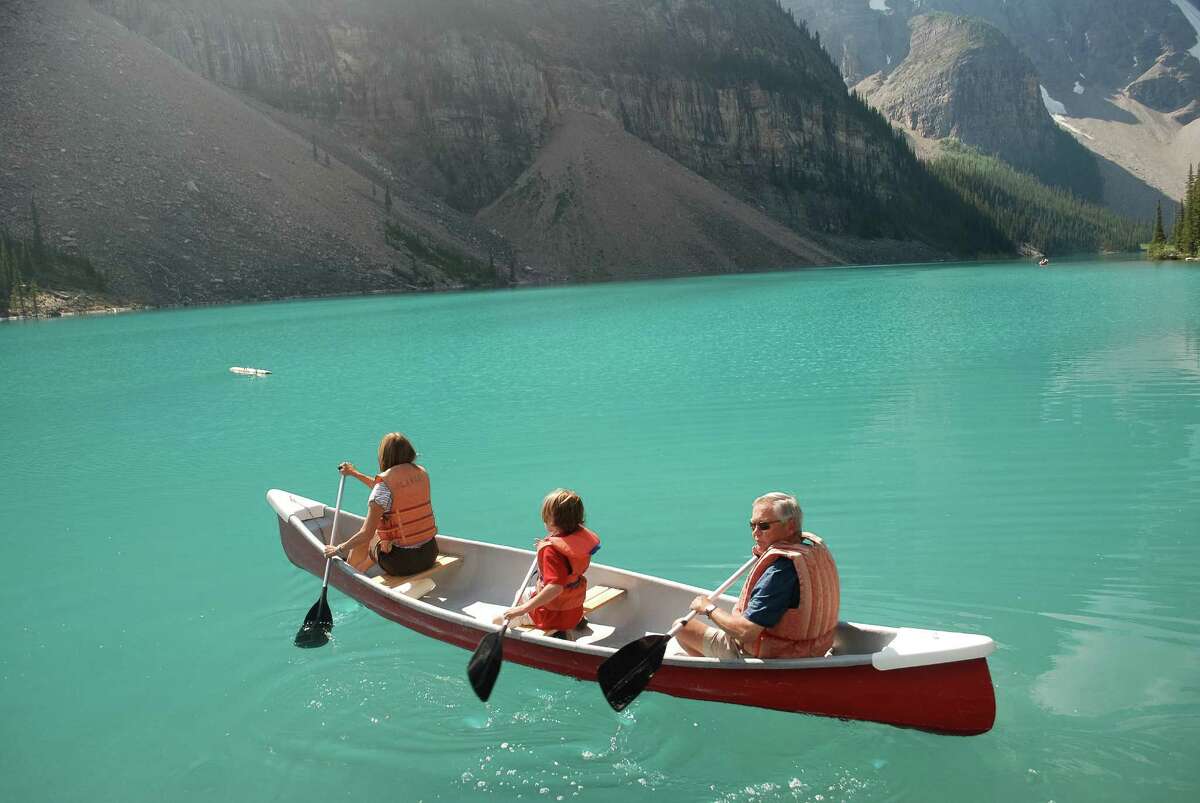 Late spring is an ideal time to canoe on uncrowded Moraine Lake.