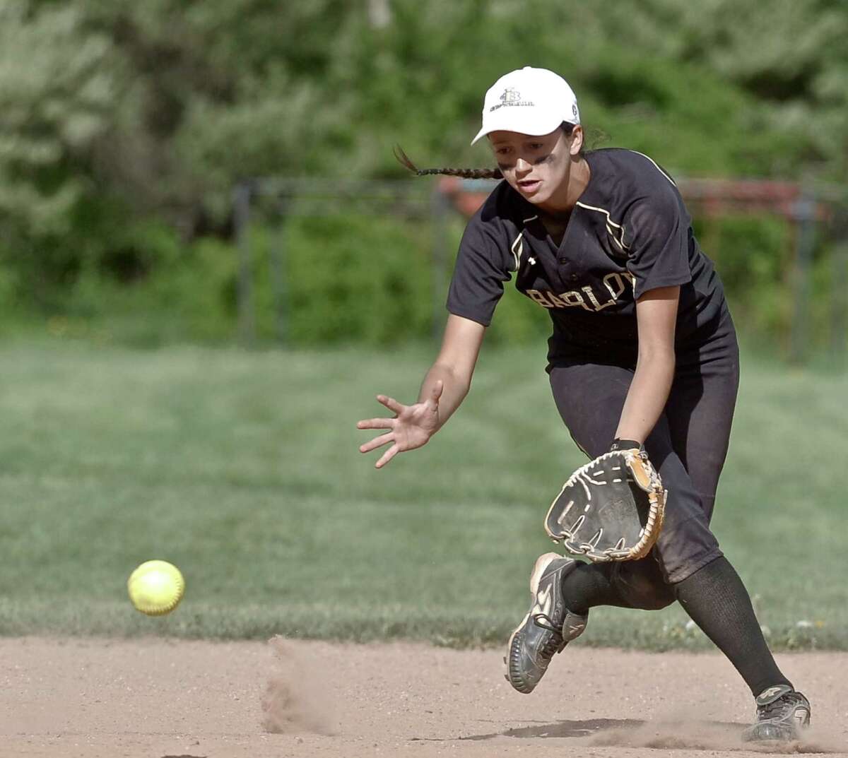 Barlow's Briana Marcelino (8) fields a ground ball during the girls high school softball game between Joel Barlow and Pomperaug high schools on Wednesday, May 13, 2015, played at Pomperaug High School, in Southbury, Conn.