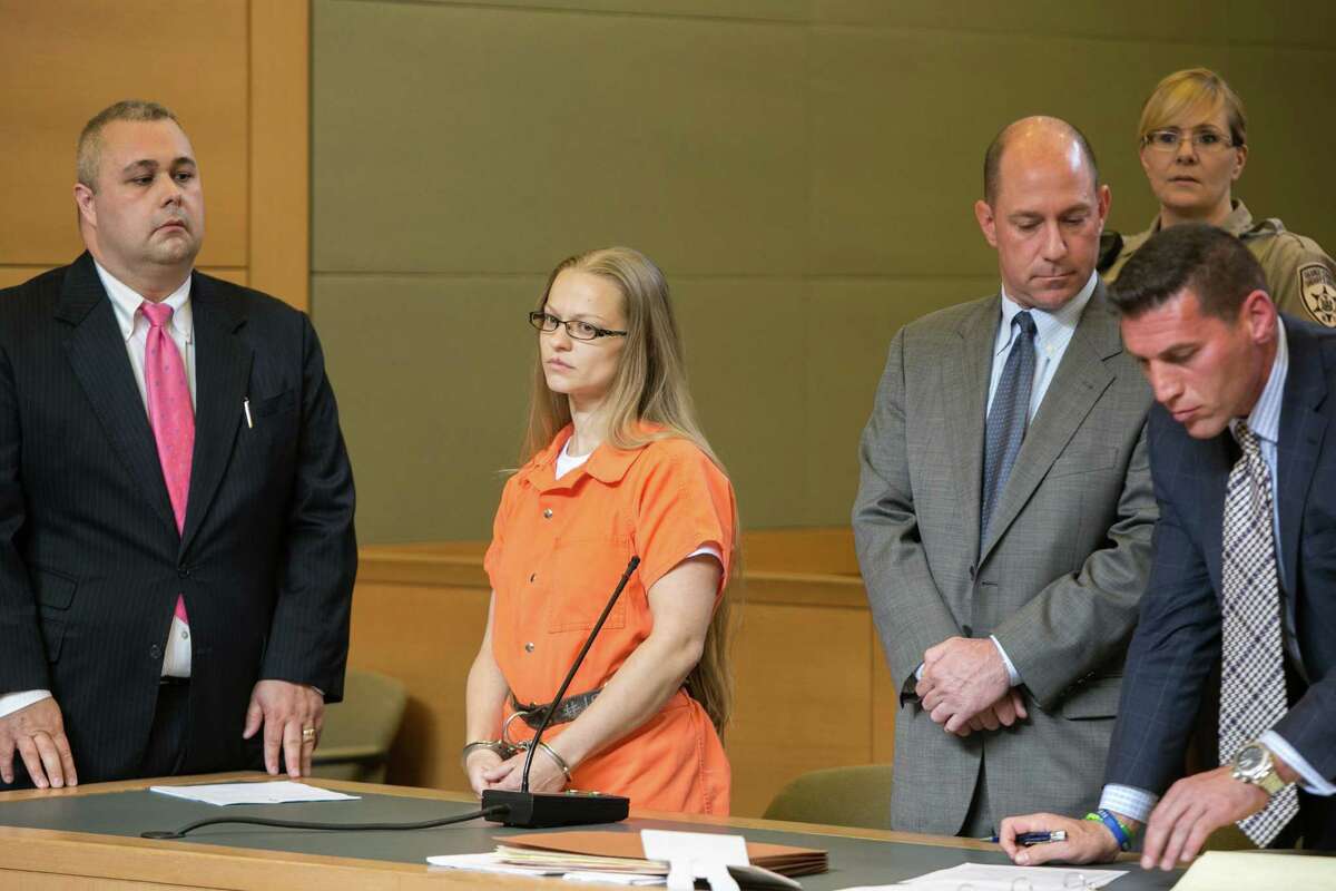 Angelika Graswald, second from left, stands in court with Michael Archer, left, a forensic scientist, as her attorneys Jeffrey Chartier and Richard Portale, right, ask for bail and to unseal the indictment against her, during a hearing Wednesday, May 13, 2015, in Goshen, N.Y. Graswald has been charged with second-degree murder in the disappearance of her fiance, Vincent Viafore while kayaking on the Hudson River. (Allyse Pulliam/Times Herald-Record via AP, Pool) ORG XMIT: NYMID206