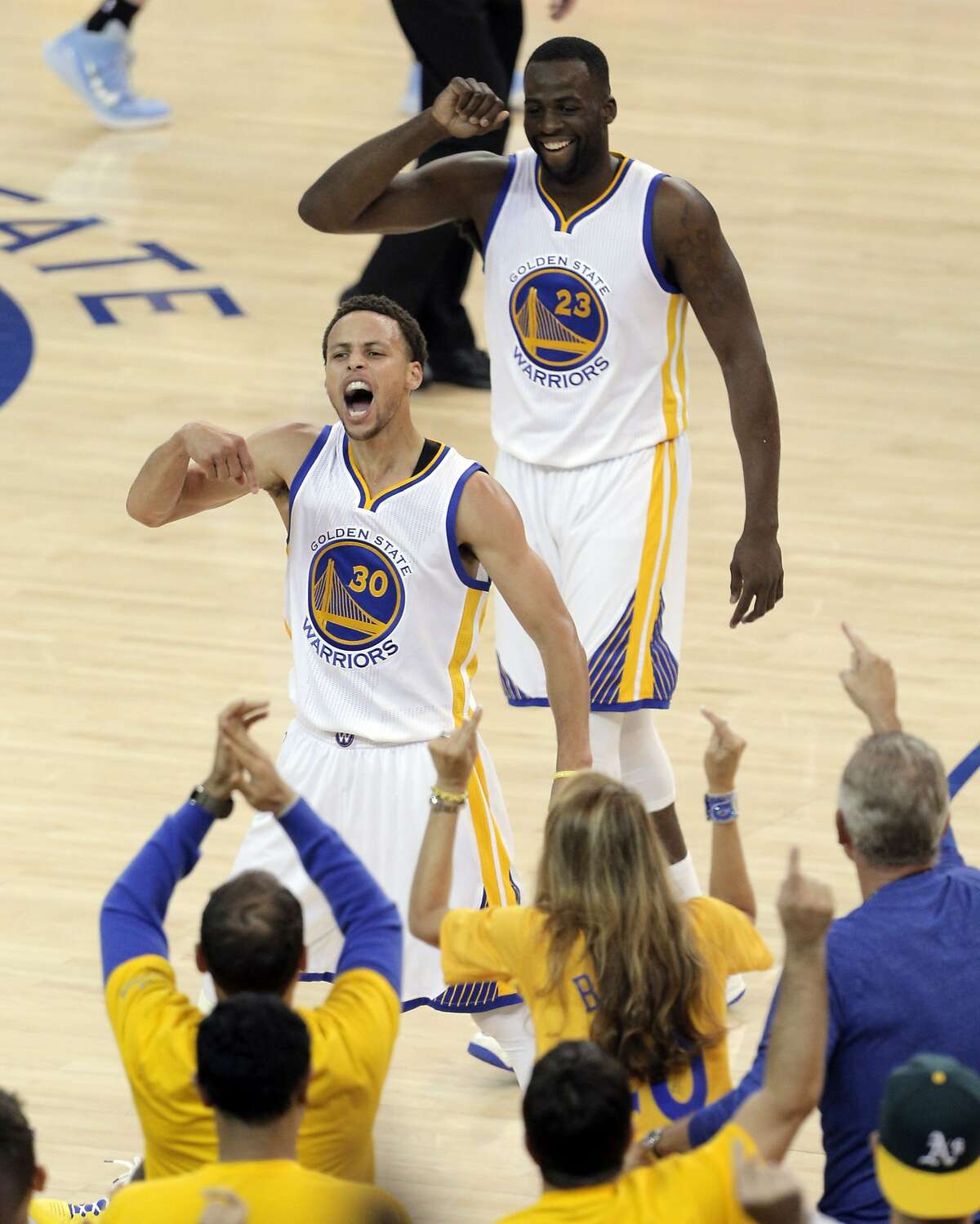 Stephen Curry (30) reacts after hitting a three-pointer to tie the game In the first half. The Golden State Warriors played the Memphis Grizzlies in Game 5 of the Western Conference Semifinals at Oracle Arena in Oakland, Calif., on Wednesday, May 13, 2015.