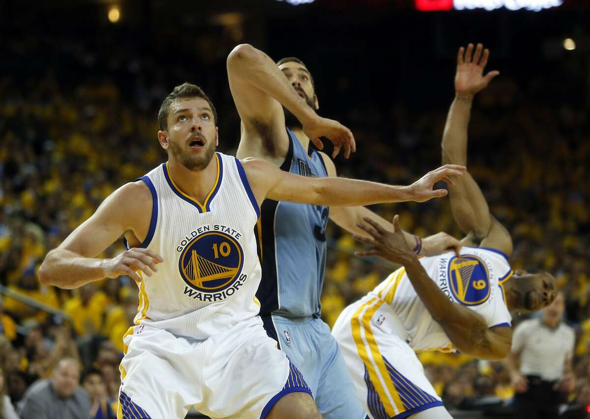 Golden State Warriors' David Lee and Andre Iguodala battle Memphis Grizzlies' Marc Gasol for rebound position in 4th quarter of Warriors' 98-78 win during Game 5 of NBA Playoffs' Western Conference Semifinals at Oracle Arena in Oakland, Calif., on Wednesday, May 13, 2015.