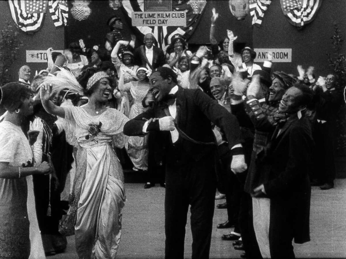 Odessa Warren Grey and Bert Williams in “Lime Kiln Field Day,” a 1913 silent film.