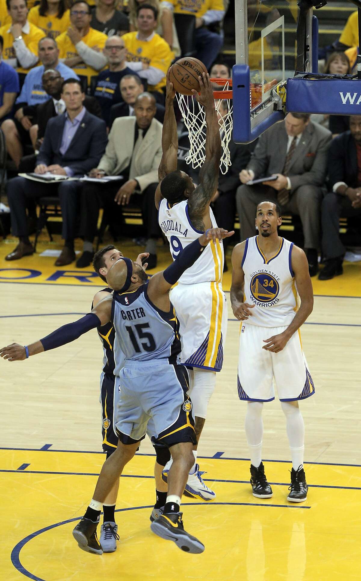 Andre Iguodala (9) dunks the ball In the second half. The Golden State Warriors played the Memphis Grizzlies in Game 5 of the Western Conference Semifinals at Oracle Arena in Oakland, Calif., on Wednesday, May 13, 2015. The Warriors defeated the Grizzlies 98-78.