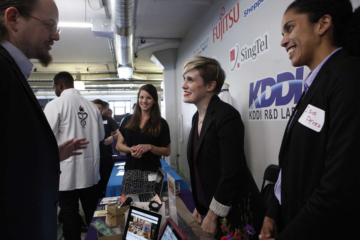 (R-L) Synchronicity cofounders Isamarie Perez, Amanda Conley and Chelsey McKrill speak to Dave Hodges about their company during the 420 Pitch event, Monday, May 11, 2015, in San Francisco, Calif. The event brought together weed entrepreneurs and tech investors. The company's slogan is "Cannabis curated for women, by women."