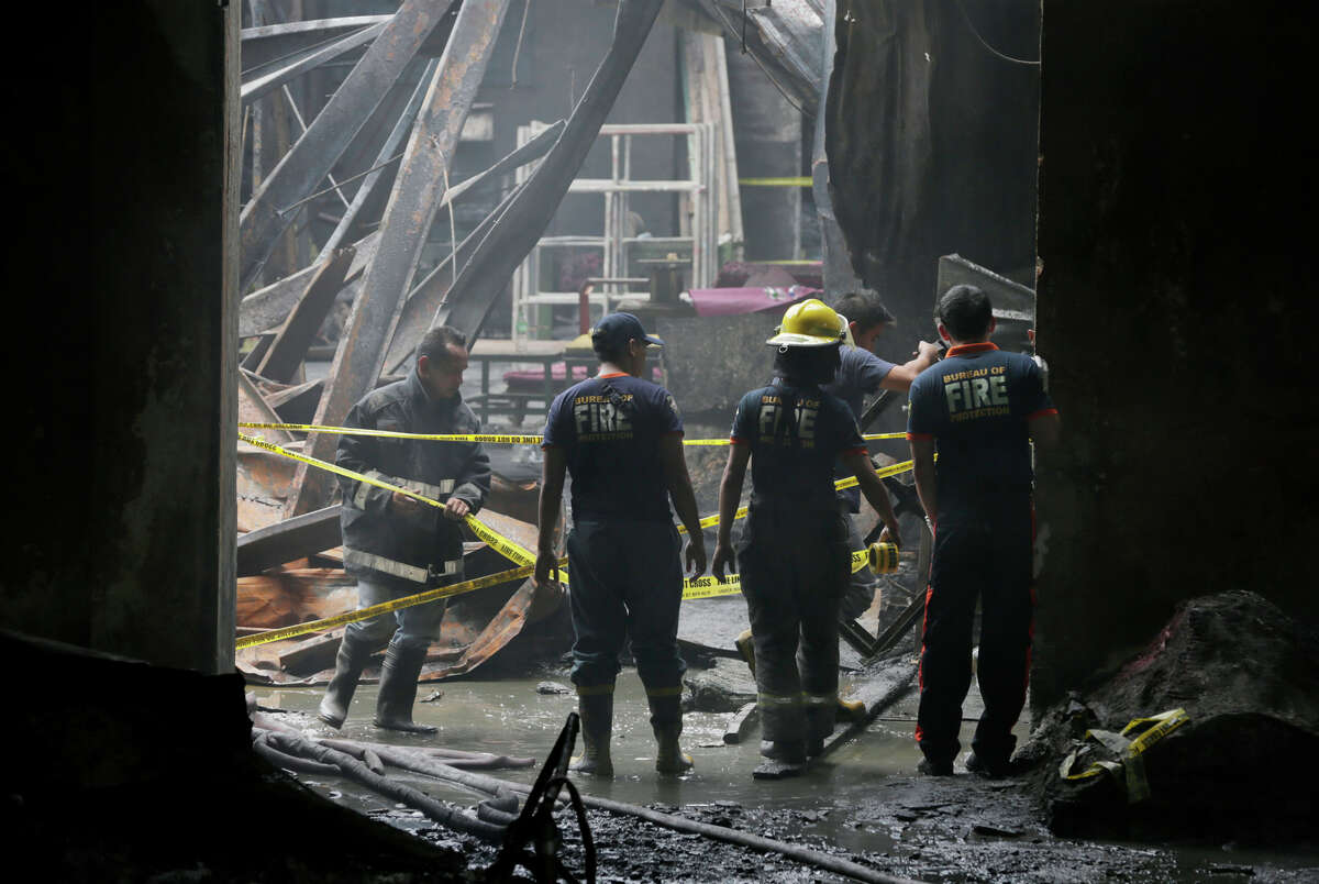 Philippine police investigate footwear factory fire that killed 72