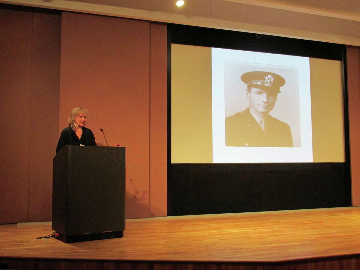 Florence Phillips of Cos Cob speaks about her father Mason Hammond's World War II experiences before a screening of the film "The Monuments Men" in the Cole Auditorium of Greenwich Library.