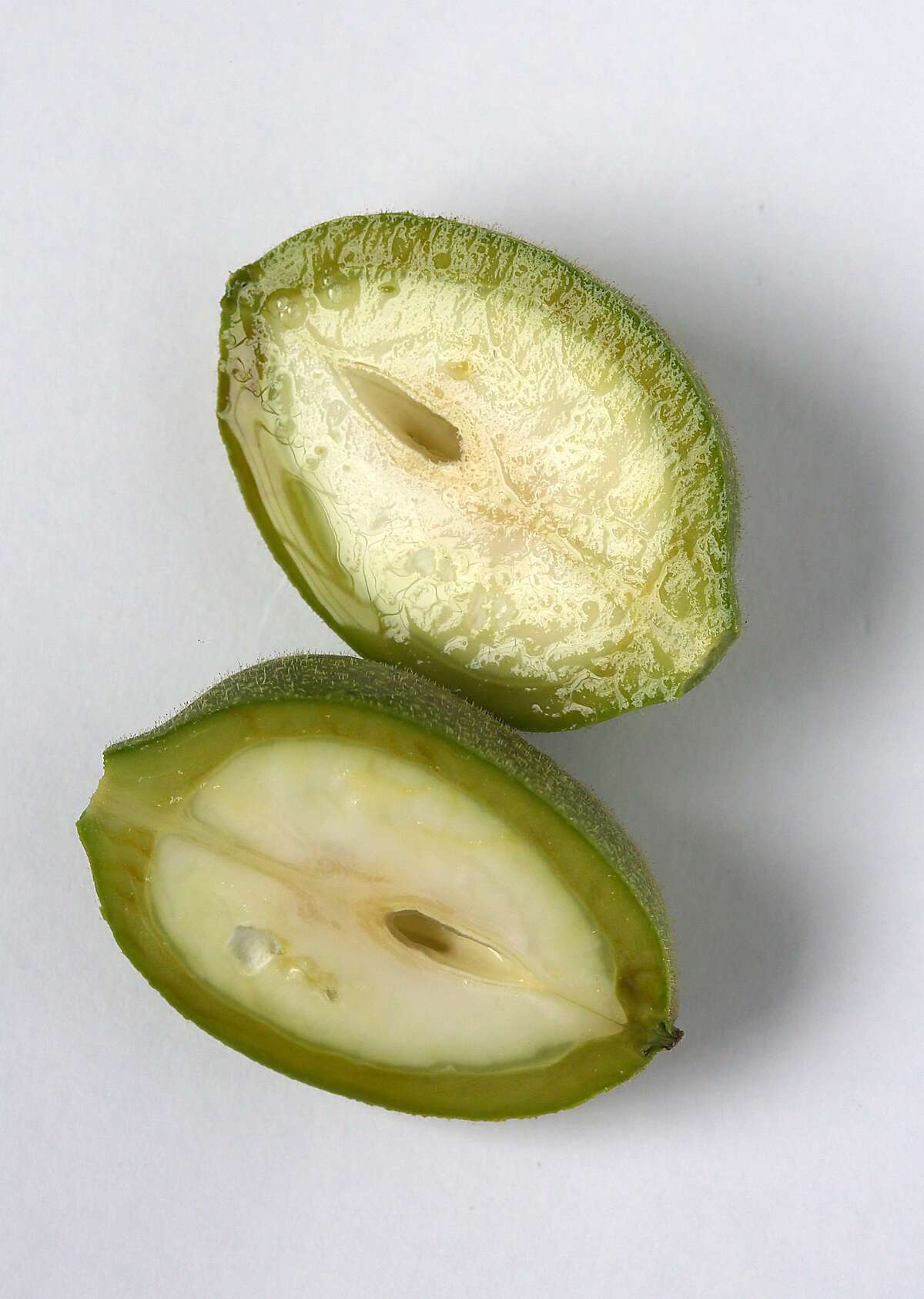 Recipe for Italian liqueur nocino starts with green walnuts