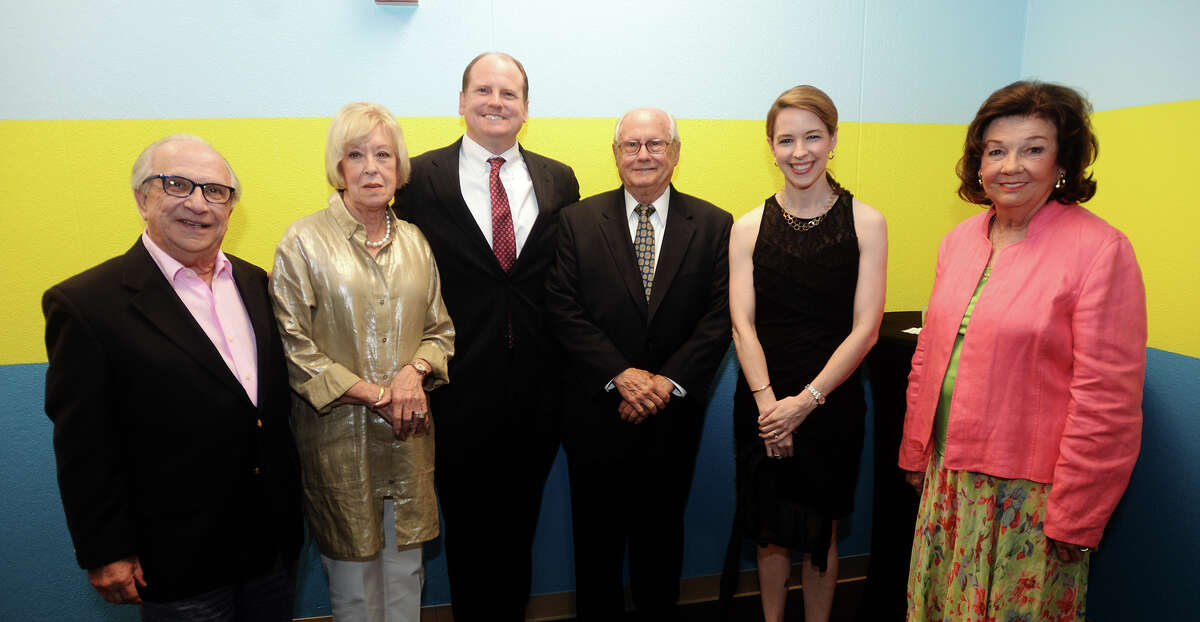 Anthony Asta, Rosemary Asta, Matt Matheny, Mike Matheny, Julia Matheny, and Sarah Matheny, left to right, pose for a photo Thursday evening. The Beaumont Children's Museum held their 2015 gala, A Night at the Museum, on Thursday at their facilities in the Beaumont Civic Center. The gala acted as both a fundraiser event and a facility reveal. The museum is aiming for an opening date in the second week of June. Photo taken Thursday 5/14/15 Jake Daniels/The Enterprise