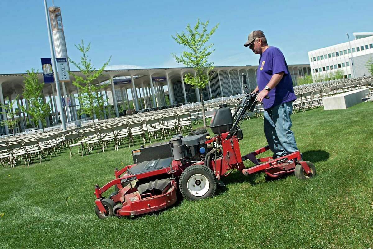 Grounds keeper Joe Wagner mows the lawn in preparation for this weekend's graduation ceremonies at the University at Albany on Thursday, May 14, 2015 in Albany, N.Y. (Lori Van Buren / Times Union)