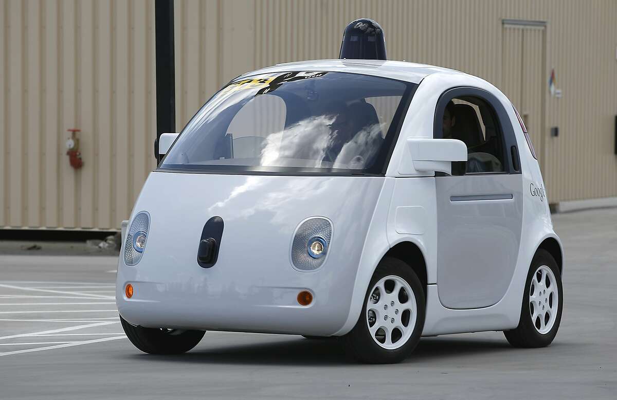 Google's new self-driving prototype car drives around a parking lot during a demonstration at Google campus on Wednesday, May 13, 2015, in Mountain View, Calif. (AP Photo/Tony Avelar)