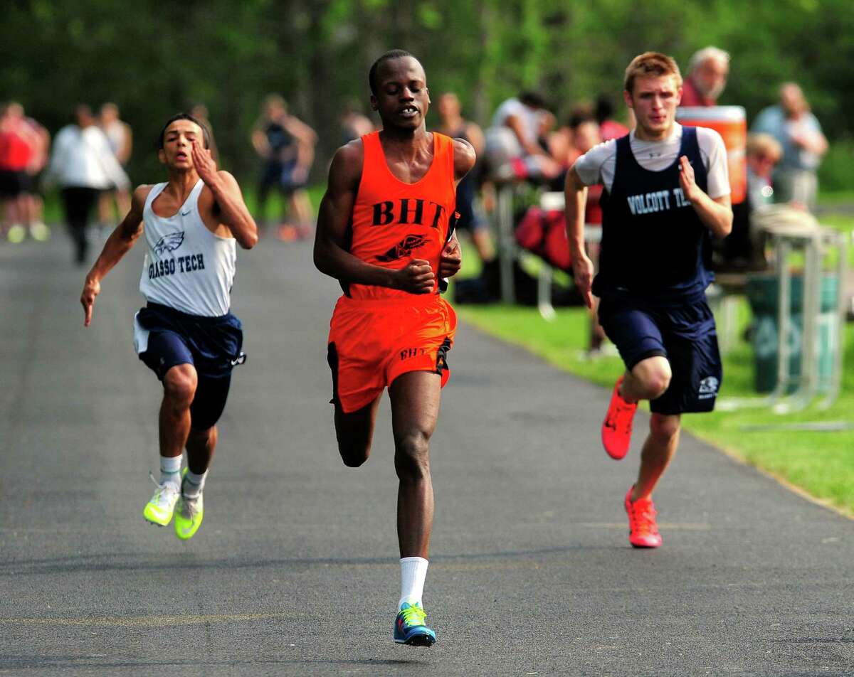 Bullard Havens' Daniel Kitoko handily wins a heat of the 100 meter dash, during boys and girls track action at Platt Tech in Milford, Conn., on Friday May 15, 2015.