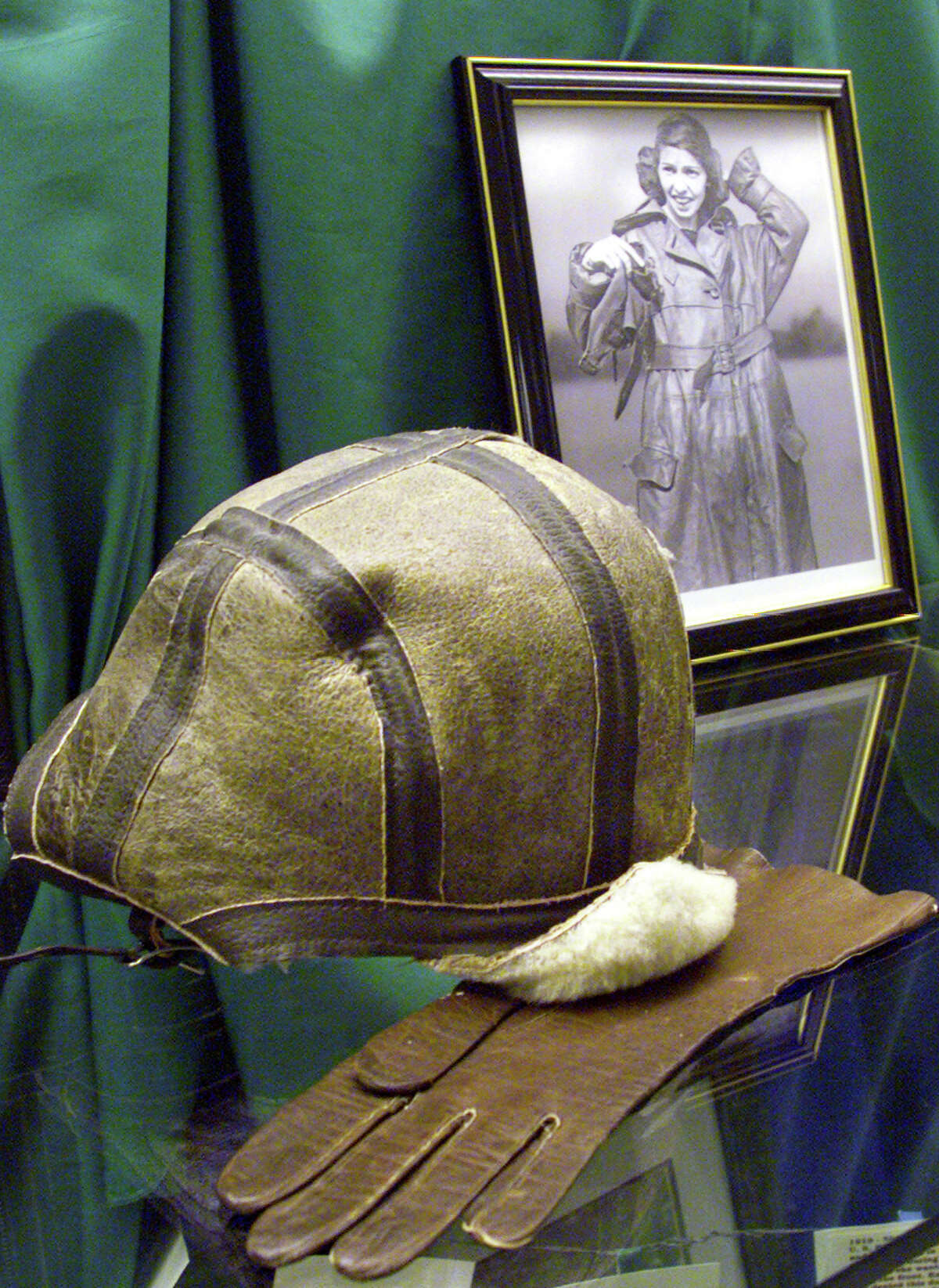 The flying hat and gloves once belonging to Katherine Stinson have been displayed in the hallway at Stinson Middle School on the northside.