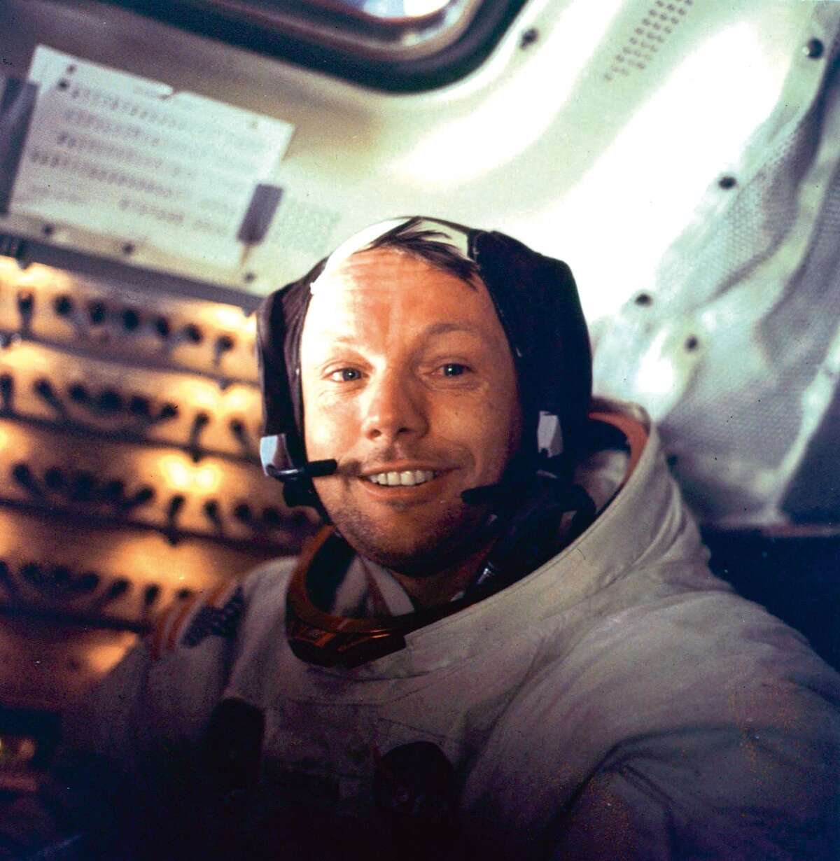 Apollo 11 space mission US astronaut Neil Armstrong is seen smiling at the camera aboard the lunar module "Eagle" on July 21, 1969 after spending more than 2½ hours on the lunar surface.