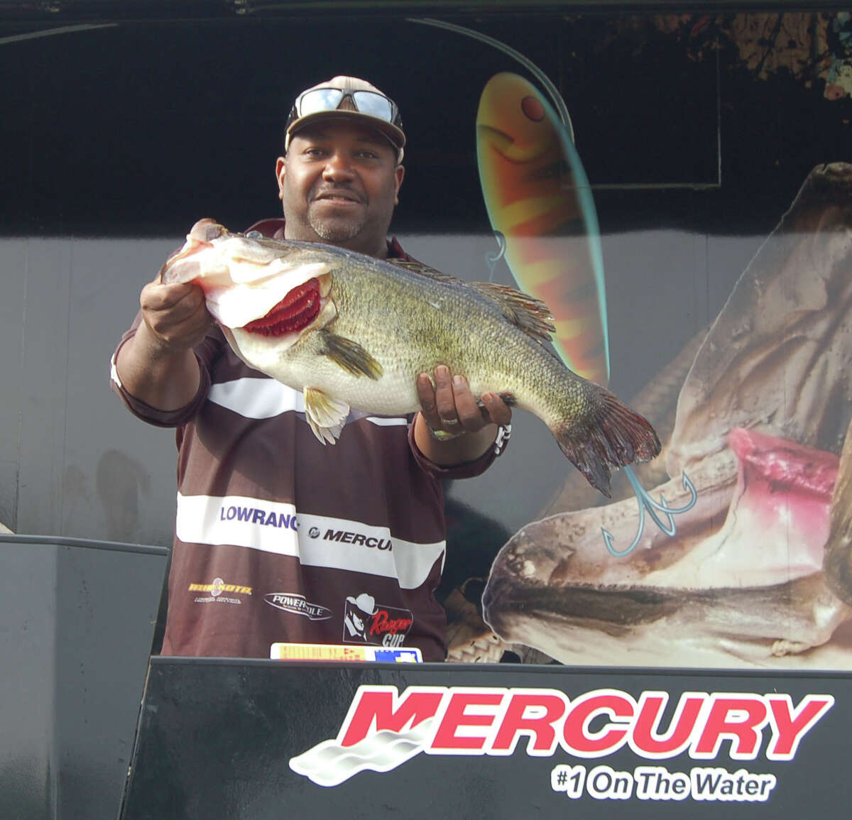 Gil Leger of Lake Charles, LA took over the lead of the Big Bass Splash Saturday with this 11.48 lb lunker Photo by Patty Lenderman, Lakecaster