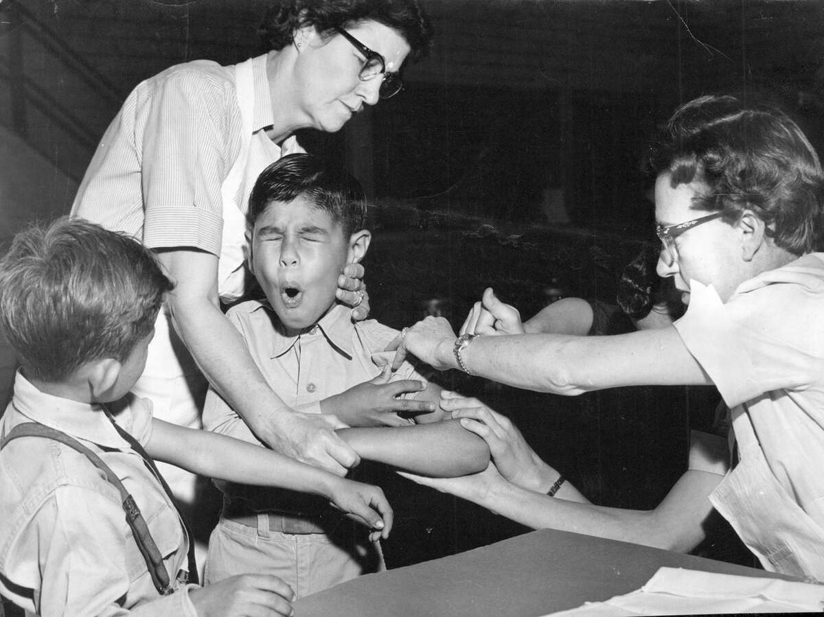 In 1953, Gilbert Sanchez winced as he received a polio vaccination in San Antonio.