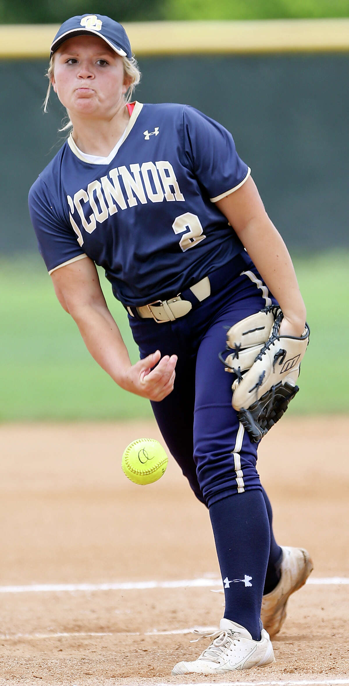 O'Connor's Kelsie Stone pitches against Corpus Christi Carroll in Game 2 of the Class 6A best-of-3 third-round high school softball playoff series Saturday May 16, 2015 at Northside ISD Complex. O'Connor won 3-2 and won the series 2-0.