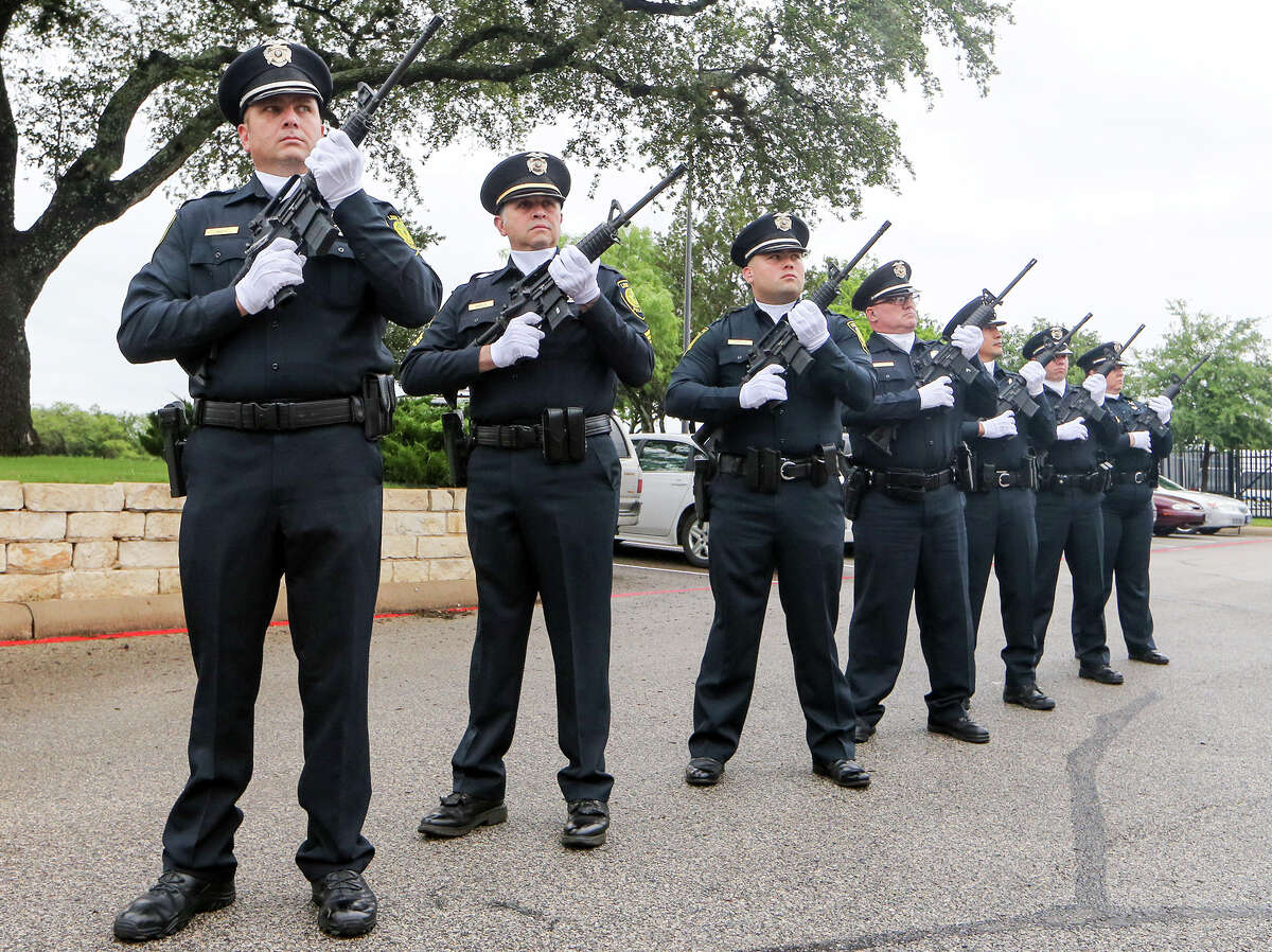 The Live Oak Rifle Team fires a 21-gun salute during the Live Oak Peace Officer Memorial at the Live Oak Justice Center, 8001 Shin Oak Drive, on Wednesday, May 13, 2015. MARVIN PFEIFFER/ mpfeiffer@express-news.net