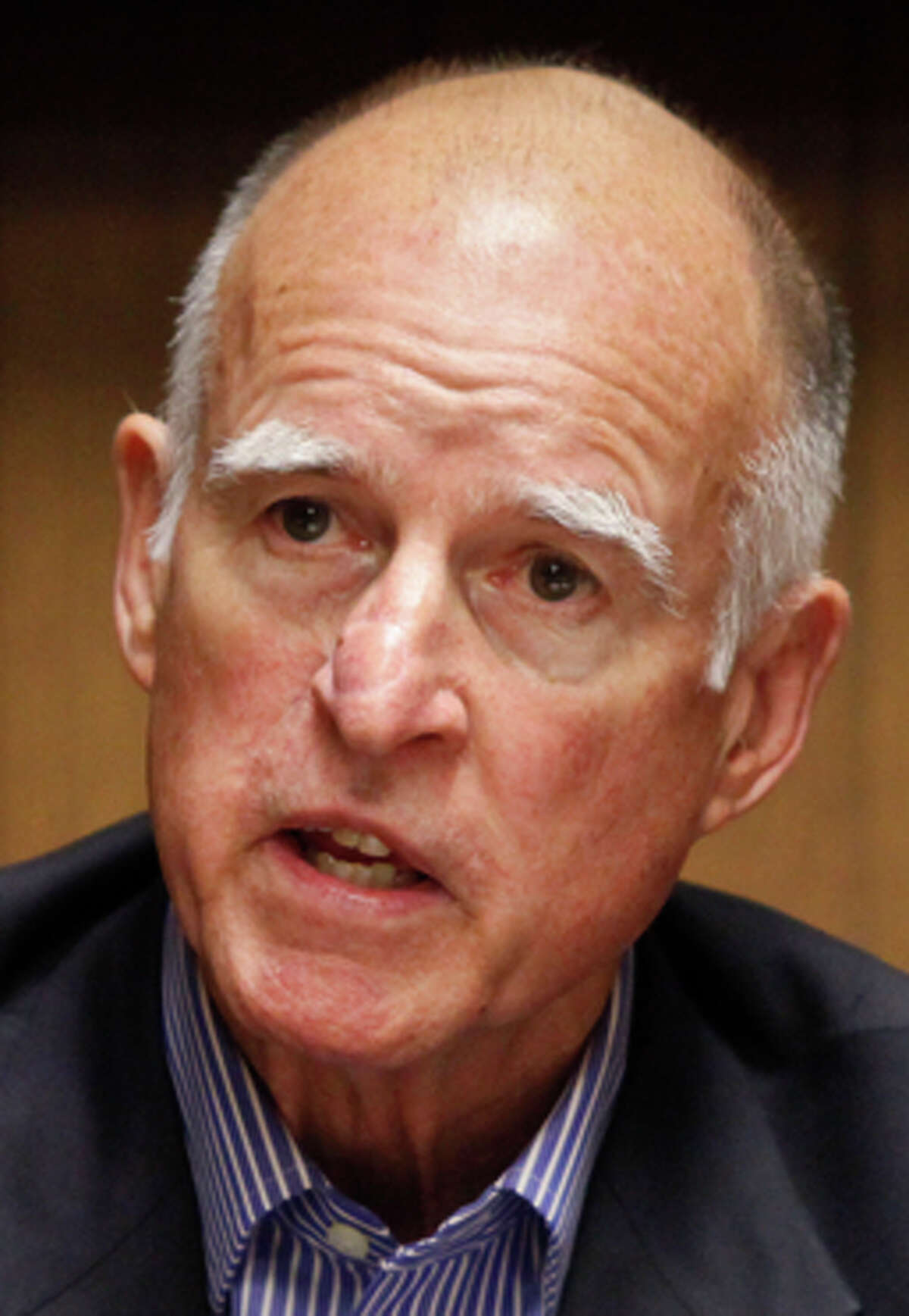 Gov. Jerry Brown has called for significant mandatory cuts.