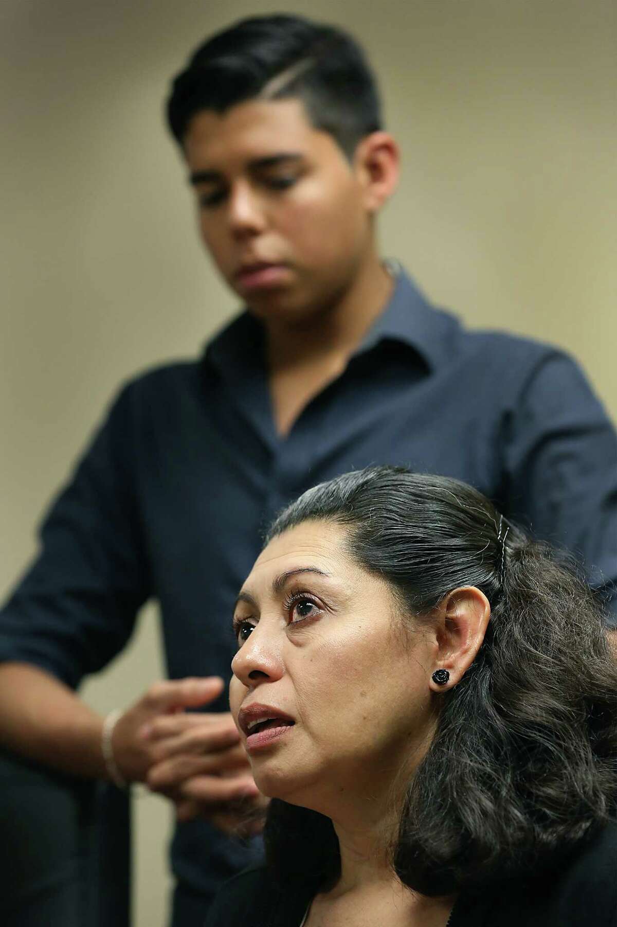 Lesly Cabrera, below, a Honduran mother who is seeking asylum here due to violence aimed at her 17 year-old son Edwuard, above, while they lived in San Pedro Sula, was denied application for asylum in immigration court on Monday, May 18, 2015. Her son Edwuard has a separate case and hopes to gain residency.