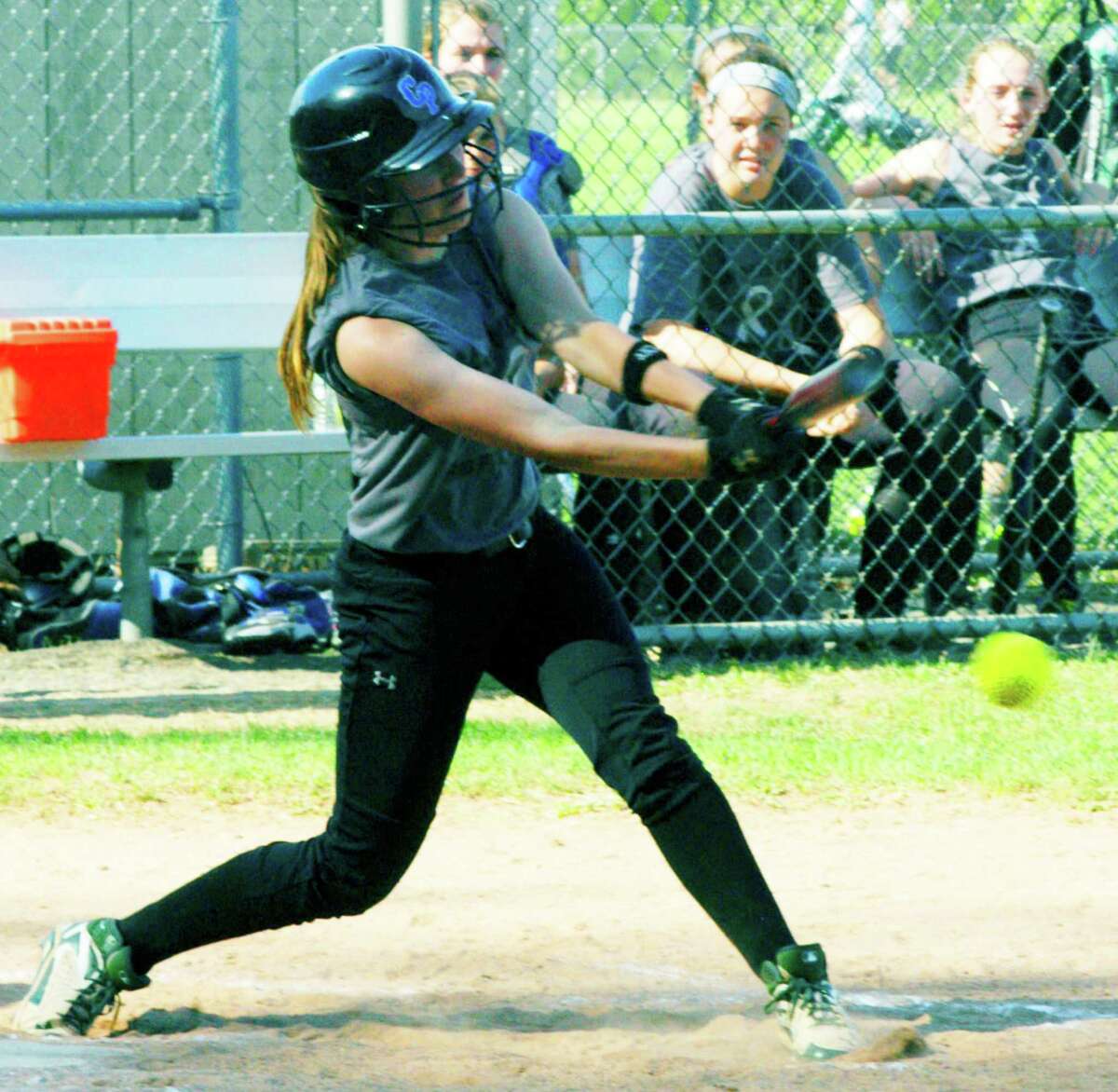 Caitlin Farrell of the Green Wave rips a hard grounder during New Milford High School softball's game vs. Pomperaug, May 11, 2015 at NMHS.