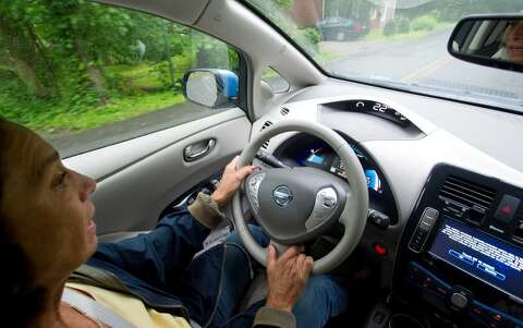 State To Offer Rebates For Electric Cars Connecticut Post Etta Kantor Drives Her Nissan Leaf In New Canaan On Thursday June 13 2017