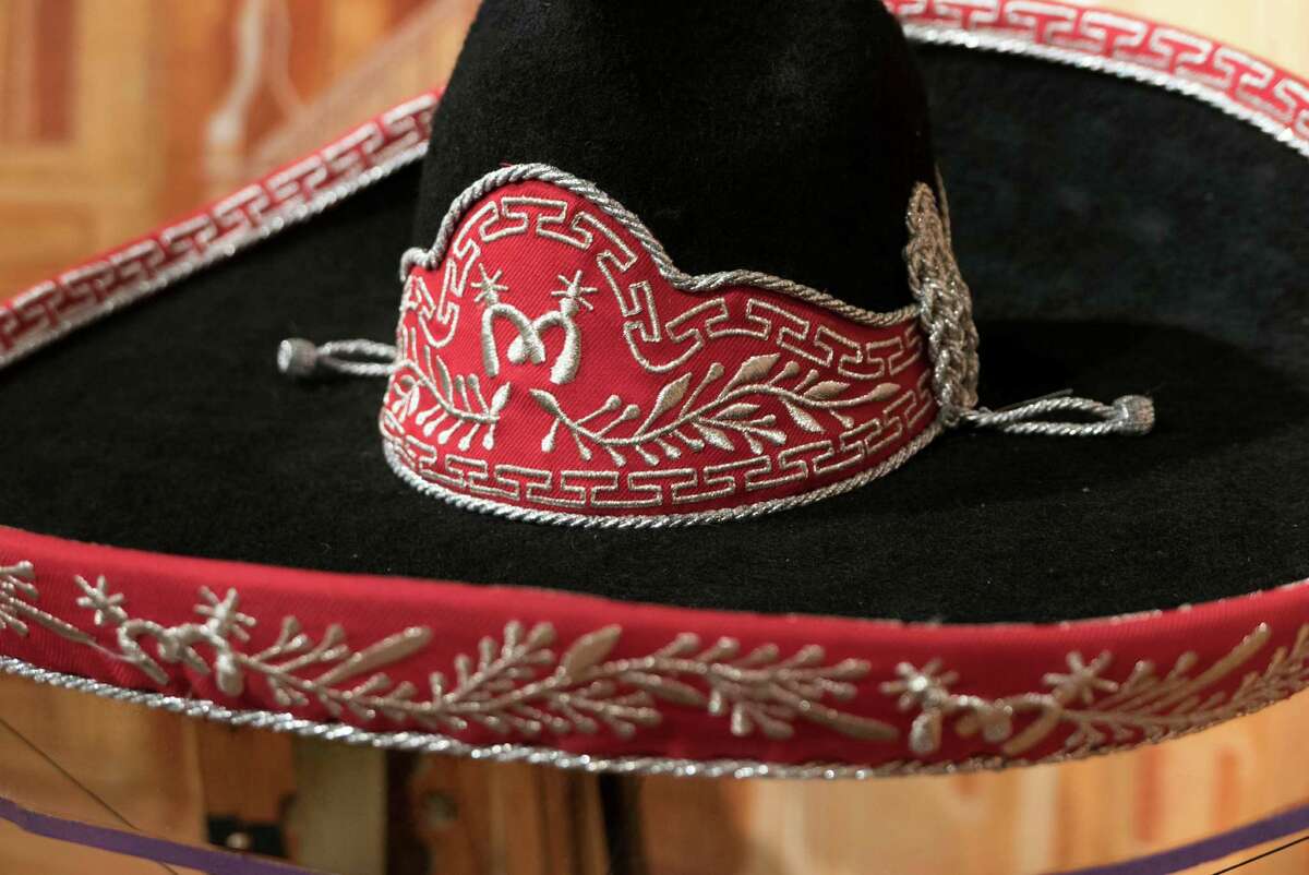 A mariachi hat worn by Sebastien De la Cruz, the young singer who was the target of hateful comments after singing the national anthem before a San Antonio Spurs championship series game in 2013, is on display at the UTSA Institute of Texan Cultures exhibit entitled "Los Tejanos."