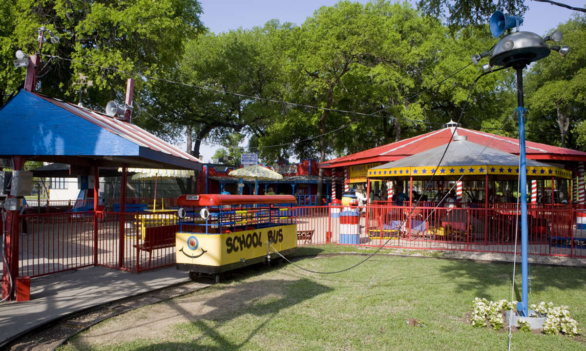 Kids love to ride on the yellow school bus ride at Kiddie Park.