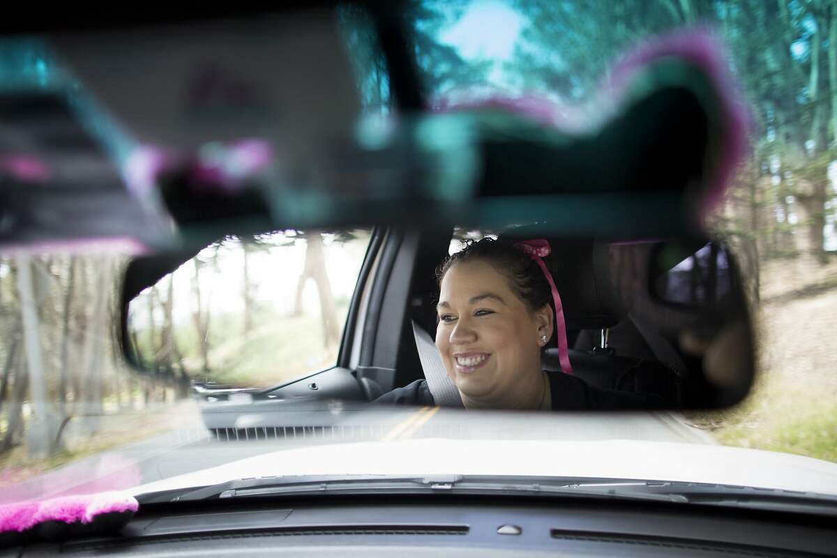 Rachel Powell, a Lyft driver, taxis passengers in the Presidio in San Francisco, Calif. on Tuesday, May 19, 2015.