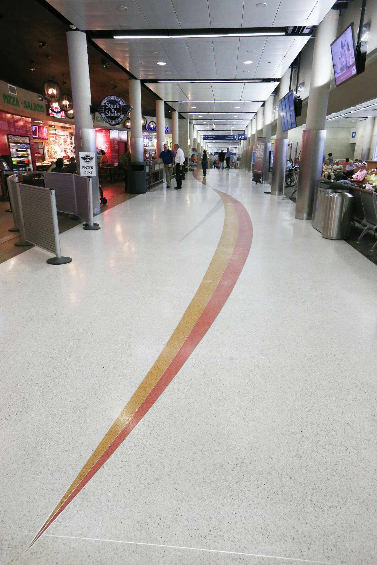 New tile flooring was part of a $35.6 million project to renovate Terminal A at the San Antonio International Airport, as seen in this 2014 photo.