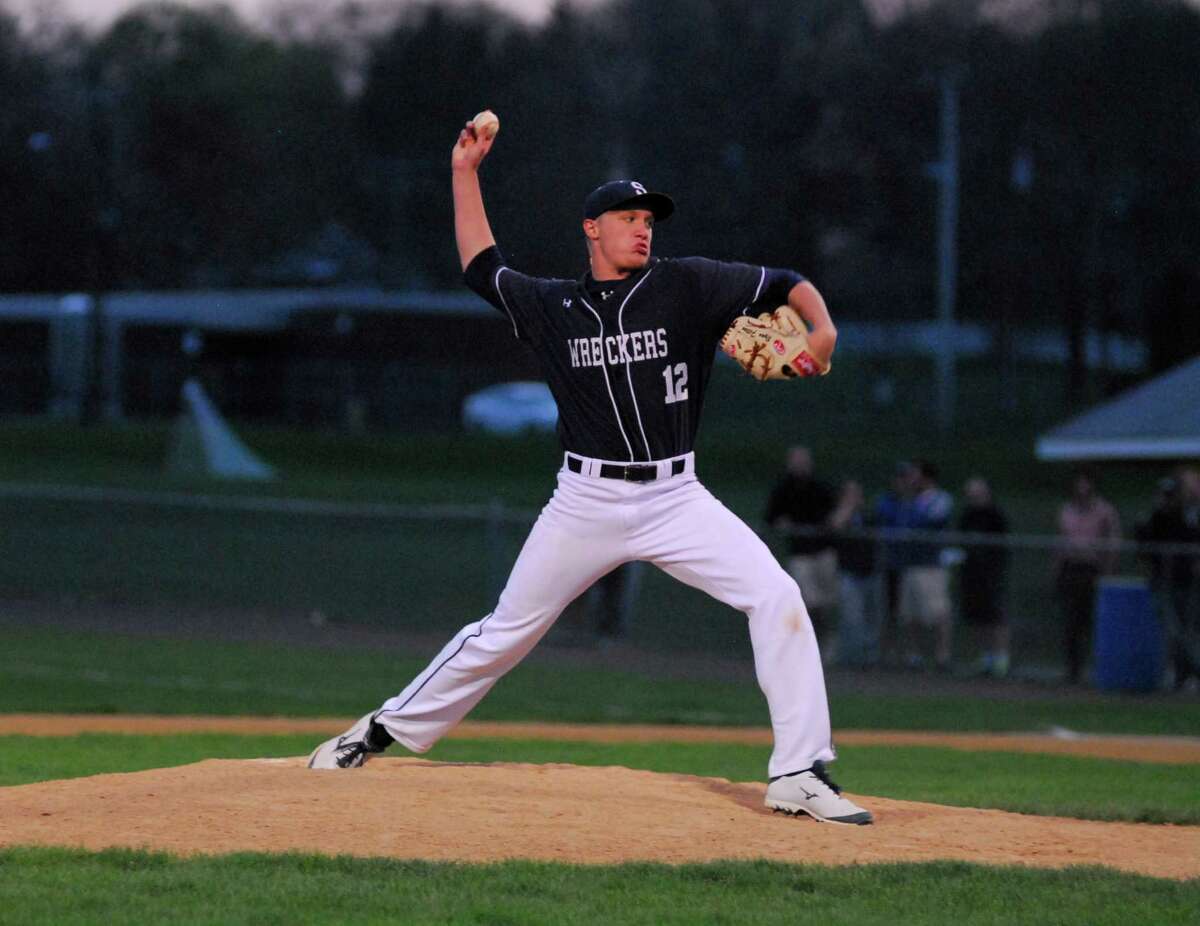 Staples pitcher Ryan Fitton throws a pitch during a game against Trumbull on Monday.