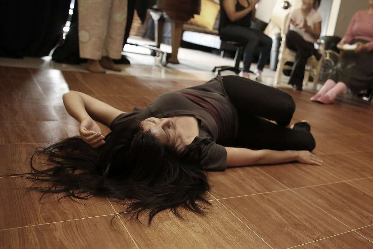An artist dances at a performance workshop lead by Sangria Red at the Center for Sex and Culture in San Francisco, California, on Tuesday, May 19, 2015.