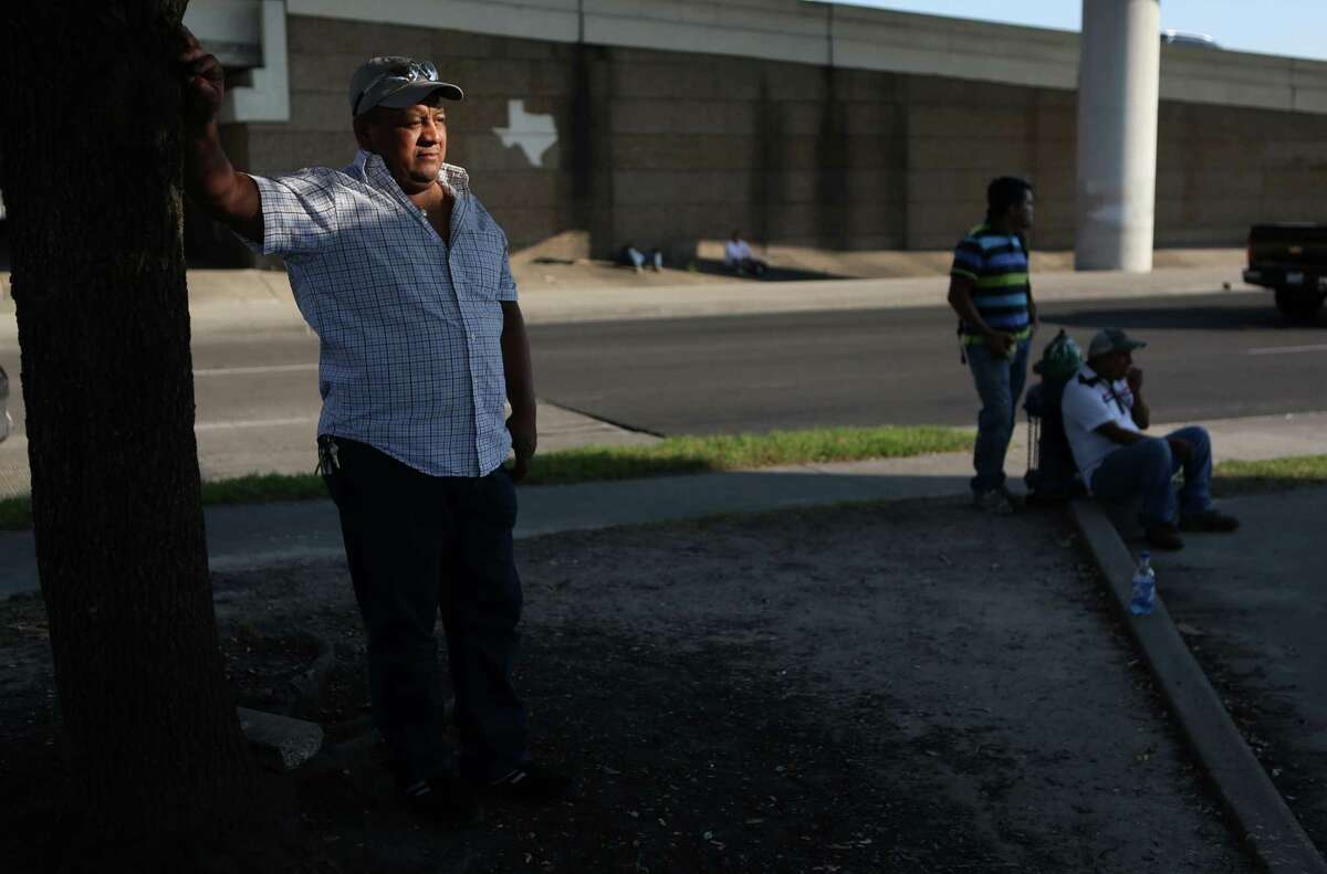 Antonio Garcia waits for work at the Shell Gas Station in the corner of Westpark Drive and Southwest Freeway, a known pick up point for day laborers. This is one of the sites where 'Pablo and Linda' recruited day laborers to supply workers to Chinese Buffet Restaurants in Texas and across the country on Thursday, April 30, 2015, in Houston.