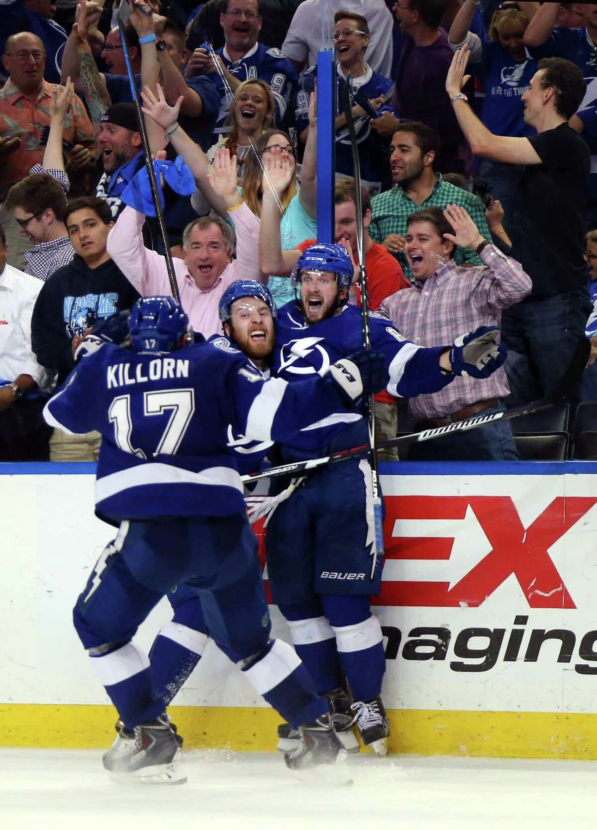 TAMPA, FL - MAY 20: Nikita Kucherov #86 of the Tampa Bay Lightning celebrates with his teammates after scoring the game winning goal in overtime to defeat the New York Rangers 6 to 5 in Game Three of the Eastern Conference Finals during the 2015 NHL Stanley Cup Playoffs at Amalie Arena on May 20, 2015 in Tampa, Florida. (Photo by Bruce Bennett/Getty Images) ORG XMIT: 554342781