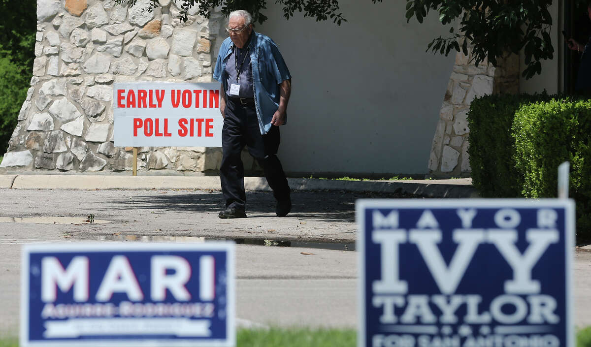 A new study indicates Texas’ voter ID law prevented some Texans from going to the polls. A man leaves a polling site in April at the Lions Field Adult Center on Broadway.