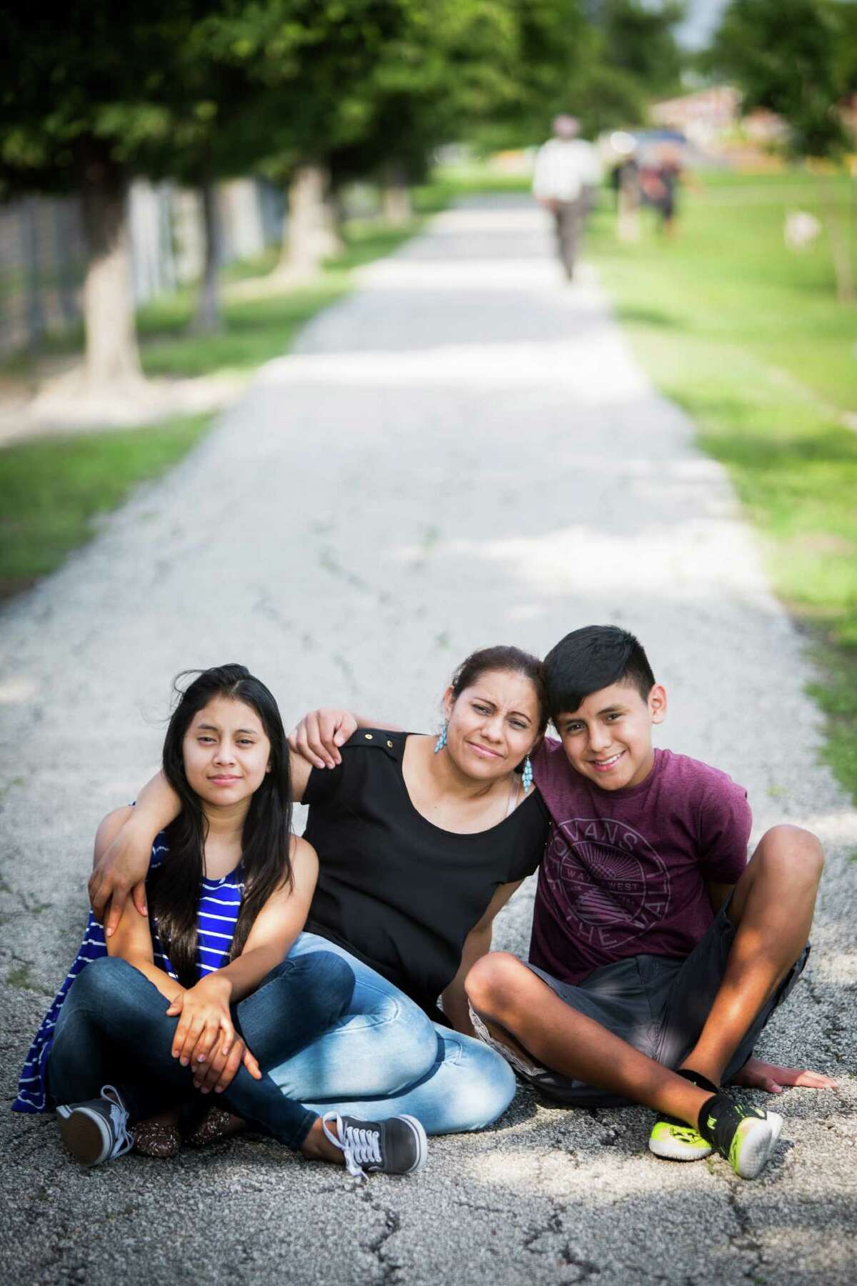 Patricia Salazar, came to the United States from Honduras eight years ago to seek a better future for her children, Linneth, 13, left, and Maykol, 14.