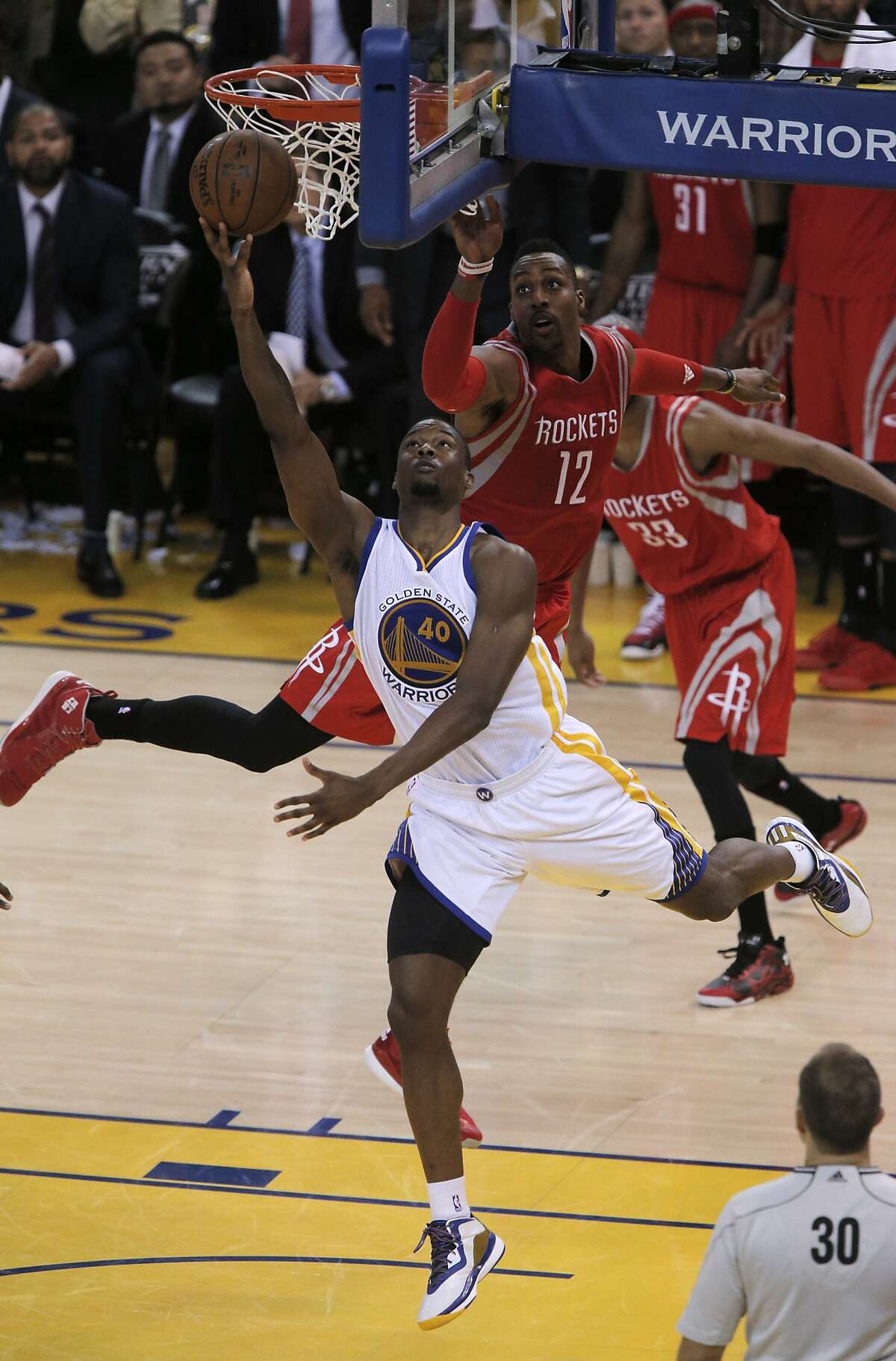 Harrison Barnes (40) tries to shoot in the fourth quarter but misses the Warriors' last shot as Golden State played the Houston Rockets in Game 2 of the Western Conference finals at Oracle Arena in Oakland, Calif., on Thursday, May 21, 2015. The Warriors defeated the Rockets 99-98.