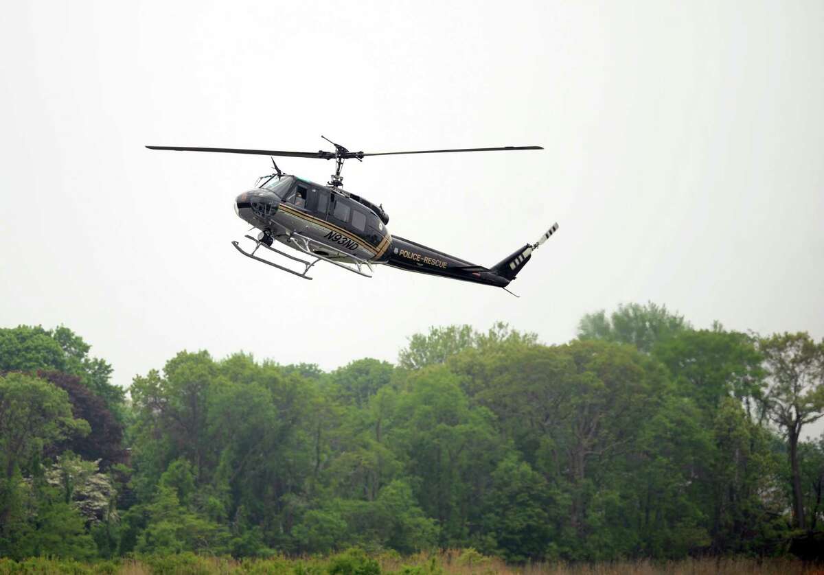The Stratford Police Department shows off their Eagle One police helicopter at an air show in Stratford, Conn.