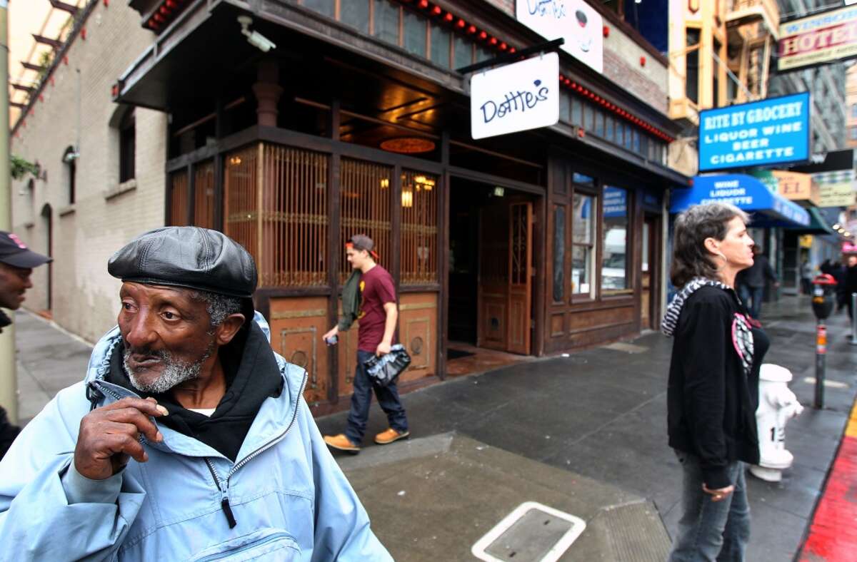 Franklin Hickman panhandles in front of Dottie's True Blue Cafe Friday, Jan. 20, 2012.